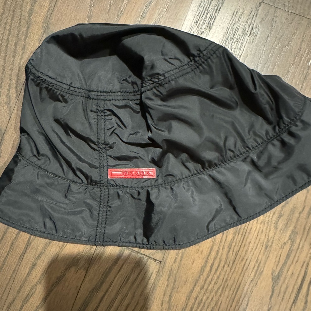 Worn 2 times. Black Prada sport rain hat.